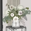 Transparent Crystal Vase With White Pink Flowers Hydrangea Dahlia And Green Foliage On Marble Table
