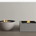 Modern Fireplaces In Concrete Shapes With Burning Flames And Black Pebbles