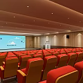Spacious Conference Room with Red Seats Wooden Walls Ceiling Lights and Stepped Seating Arrangement