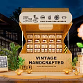 Vintage Handcrafted Fast Food Restaurant Commercial Outdoor Setup With Green Plants Decorative Flower And Chalkboard