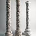 Traditional Carved Stone Pillars with Intricate Dragon Patterns in Classic Architectural Design