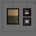 Framed Abstract Paintings On Gray Wall With Textured Surfaces And Neutral Tones