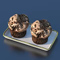 Two Chocolate Muffins Topped With Chocolate Crumbles On White Tray
