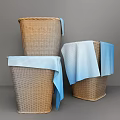 Three Woven Storage Baskets with Blue Cloth for Home Organizing and Decor