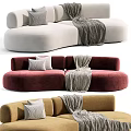 Modern Curved Sofa Designs In Beige Burgundy Brown With Pillows And Gray Blanket