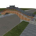 Traditional Chinese Wooden Bridge With Curved Roof Over Water And Grass Surroundings