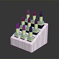 Woman's Lipstick Display With Red Pink Colors On Metal Stand Gold Base
