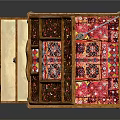 Wooden Chest Style Double Bed With Open Carved Lid And Patterned Mattress Inside