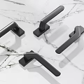 Black Modern Door Handles on White Marble Background with Sleek Contemporary Design