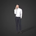 A Man Standing And Talking On Mobile Phone In White Shirt And Dark Pants