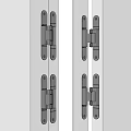 White Metal Hinges Installed On Door Panels With Hardware Components