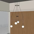 Modern Chandelier With White Spherical Globes Above Wooden Cabinets And Window Blinds