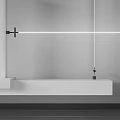 Modern Bathroom Vanity Setup With Linear Light Above White Countertop And Black Faucet
