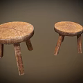 Two Rustic Wooden Stools With Round Seat Natural Wood Grain And Three Legs