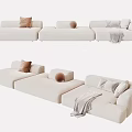 Modern Beige Sectional Sofa With Textured Pillows And Soft Throw Blanket 3d model