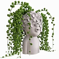 White Human Shaped Vase with White Flowers Green Hanging Vines and Small Round Leaves