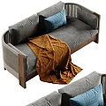 Grey Two Seater Sofa with Wooden Frame Orange Blanket and Blue Cushions