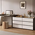 Modern Dressing Table With Dark White Drawers Laptop Cosmetics Flowers Stool And Wall Artwork