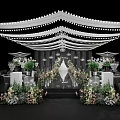 Elegant Wedding Banquet Hall With White Ceiling String Lights Flower Aisle And Chandeliers