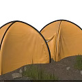 Two Orange Camping Tents Pitched With Grass And Stones In Outdoor Setting