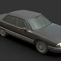 Vintage Dark Gray Sedan With Illuminated Headlights And Silver Rims