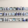 Blue And White Porcelain Ornament Decor Combination With Vases And Plates On Multiple Shelves