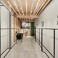 Modern Clothing Store Interior With Black Metal Frames White Walls Art Paintings And Green Plants