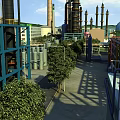 Industrial Plant Outdoor Area Featuring Large Equipment Pipes Storage Tanks Towers And Green Trees