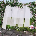 Floral Installation Archway With Green Vines Pink Flowers And White Drapes