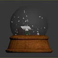 Decorative Snow Globe With Small Snow Covered House Green Tree And Wooden Base