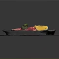 Sliced Raw Beef with Broccoli Lemon Slice and Salt on Black Plate Over Wooden Board