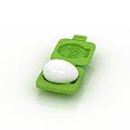 Open Green Egg Container Holding White Egg For Daily Kitchen Use