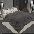 Cozy Double Bed with Gray Comforter White Pillows and Accent Chair in Modern Bedroom
