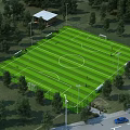 Aerial View Planning of Soccer Field With Green Lawn White Lines and Surrounding Trees