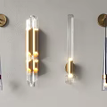 Modern Wall Sconces With Glass Shades And Gold Metal Bases Mounted On Wall