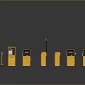 Various Yellow Parking Devices Arranged With Ticket Machines And Striped Barriers On Dark Surface