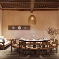 Chinese Style Private Dining Room With Round Table Wooden Chairs And Decorative Plates
