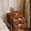 Wooden Bedside Table With Drawers Black Knobs Metal Legs And Vase With Flowers