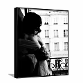 Portrait Silhouette of a Woman in Elegant Robe by Window With Parisian Building Background Black and White