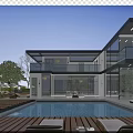 Modern Detached Villa Featuring Large Glass Windows Swimming Pool Outdoor Lounge and Blue Sky View