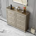 Elegant Modern Chest of Drawers with Gold Handles and Decorative Items in Grey Wall Interior