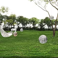 Hanging Moon And Crescent Shaped Outdoor Lights In Night Grass Scene