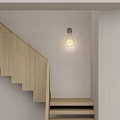 Modern Minimalist Wall Lamp Illuminating Wooden Staircase In Light Wall Home Interior
