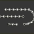 Silver Reflective Automotive Metal Chain Parts with Link Structure on Dark Background