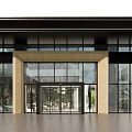 Modern Commercial Storefront With Large Glass Windows Light-Colored Pillars And Metal Frames