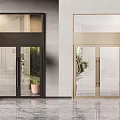 Modern Entrance With Revolving Doors Glass Doors Potted Plants And Marble Floor