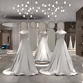 Elegant Bridal Shop Interior With White Wedding Dresses On Mannequins Chandeliers And Mirrors