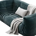 Black Leather Sectional Sofa With Padded Textured Design Light Blanket And Pillow