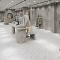 Modern Clothing Store Interior With Mannequins Hangers And Display Tables