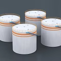 Industrial Equipment Four White Cylindrical Containers With Orange Stripes And Blue Straps
